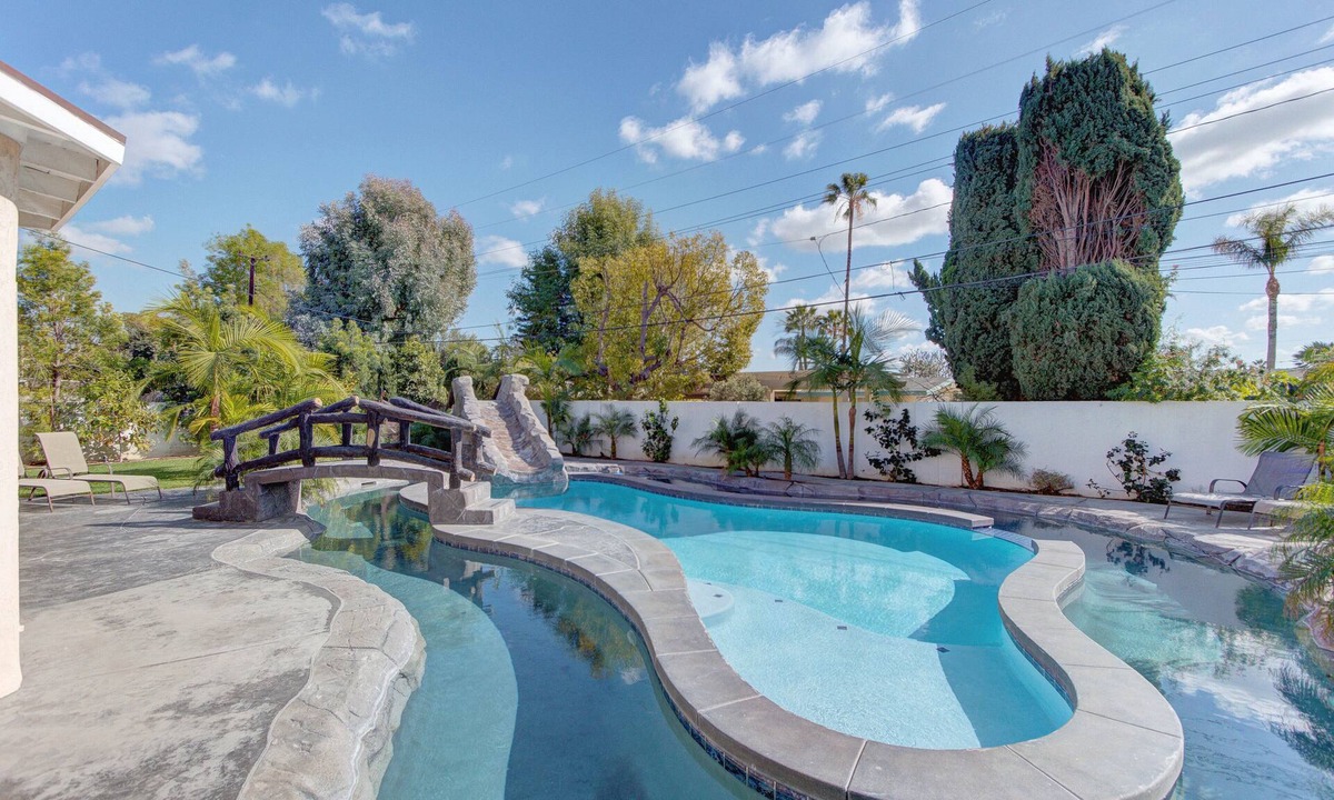 Southwest Anaheim House | 8 Bedroom Pool, Flowing Lazy River & Water Slide near Disneyland! PRIVATE OASIS!