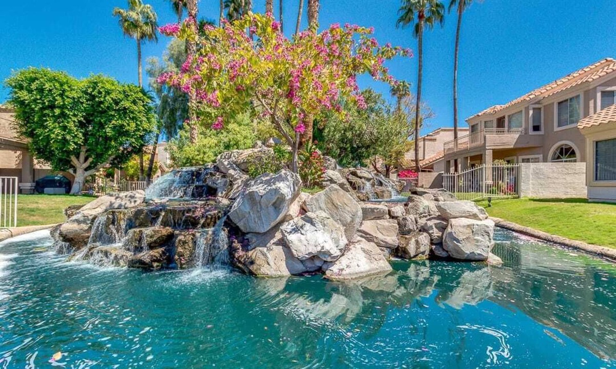 The Islands House | An Oasis with cascading waterfalls in your backyard