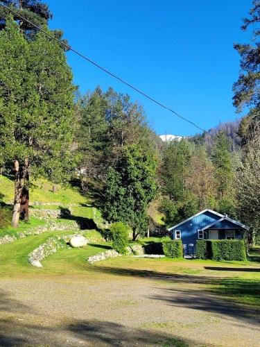 Big Bar House | Beautiful Blue Cabin Nestled on a Hill with Beautiful Mountain Views for a Relaxing Getaway by the Trinity River in California