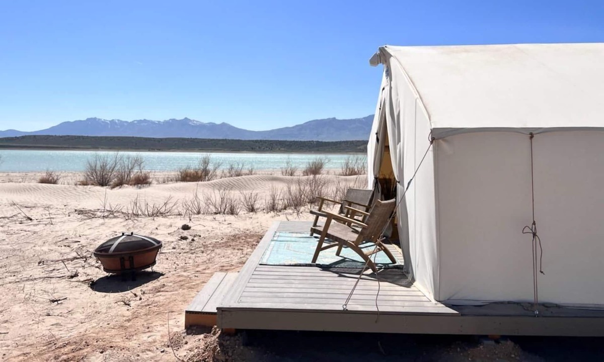 Utah House | Beautiful wall tent on sandy beach at waters edge