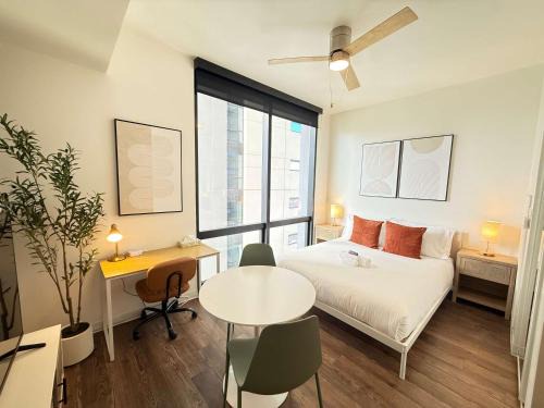 Evans Churchill Apartment | Boulevard Stays Modern Highrise STU Sky Pool Parking Gym 13