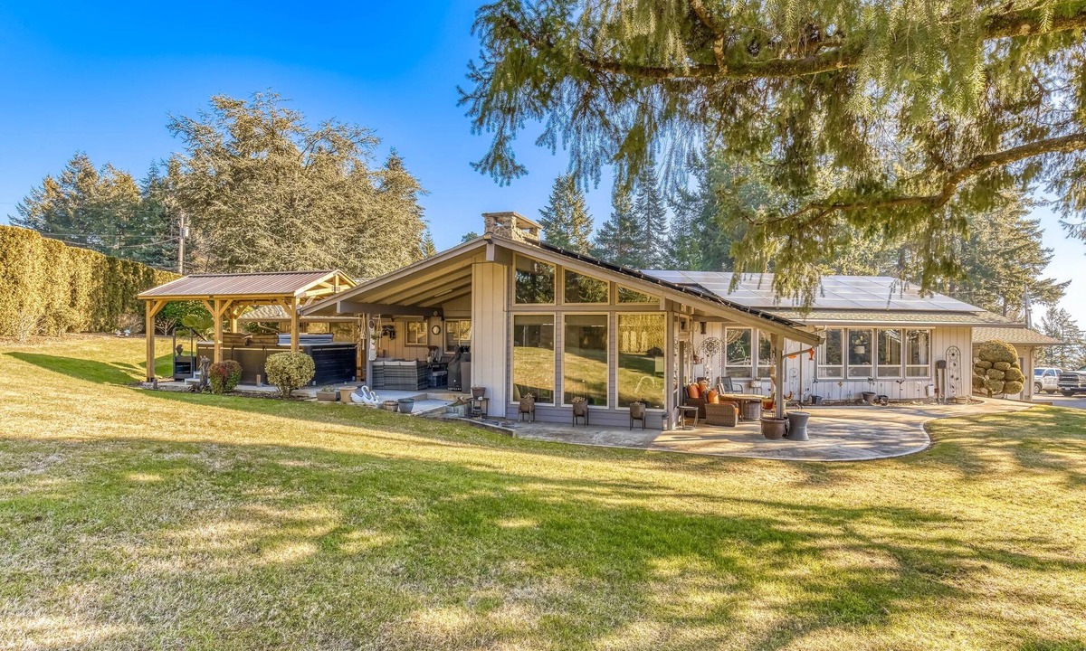 Boring House | Countryside home with private swim spa, fire pit, spacious kitchen, & game room