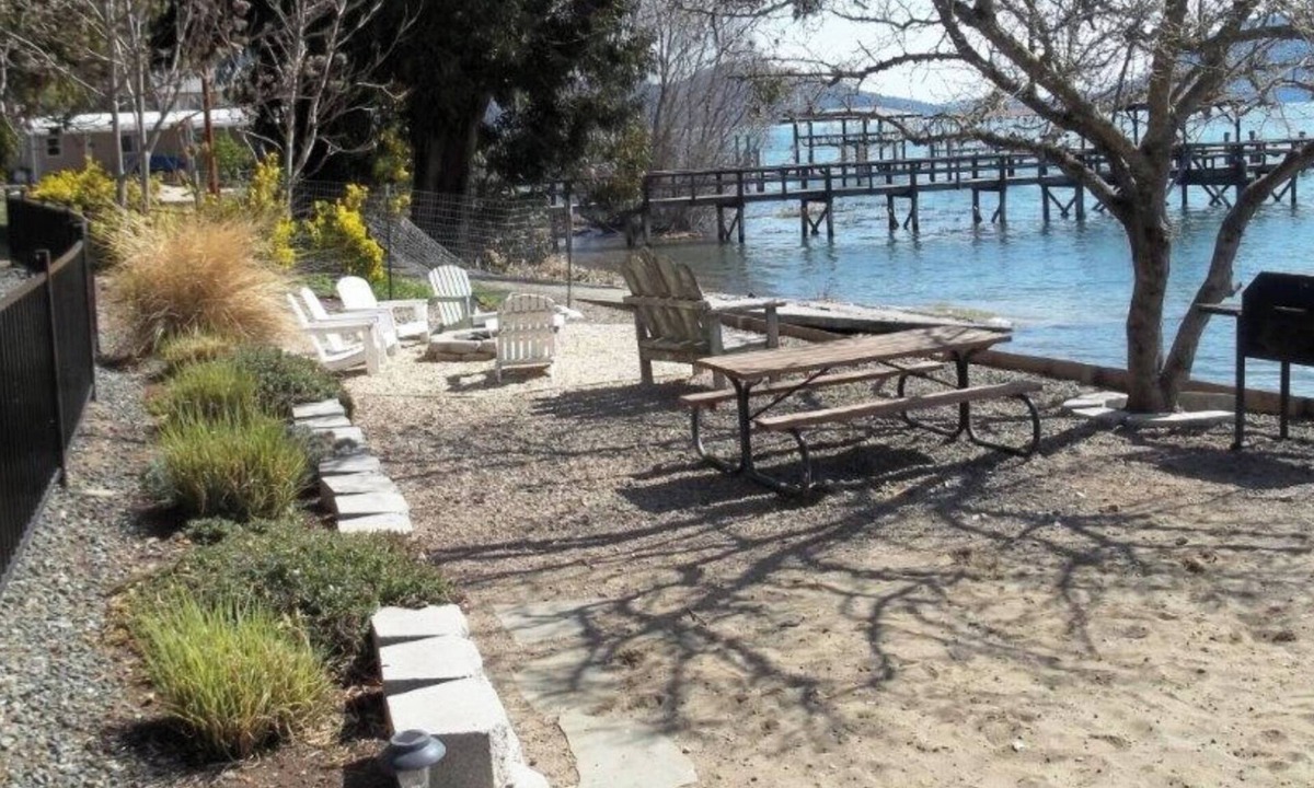 Nice Cottage | Great Price! Sunset Beach Cottage with Lovely garden, beach, and boat dock!