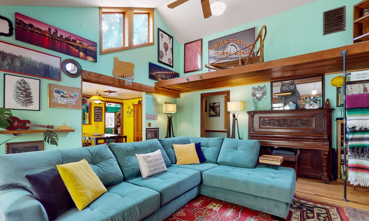 Tigard House | Inviting dog-friendly home with game room, fireplace, balcony, central AC, & W/D