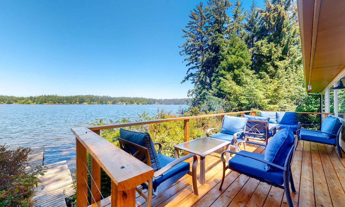 Dunes City House | Lakefront dream with private hot tub, dock, kayaks, pedal boat & amazing views
