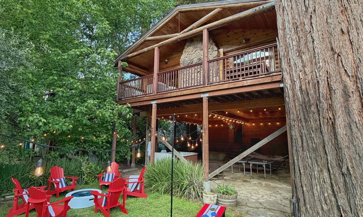 Northwood Cabin | Riverfront luxury cabin, hot tub, private dock, redwoods, ping-pong, foosball