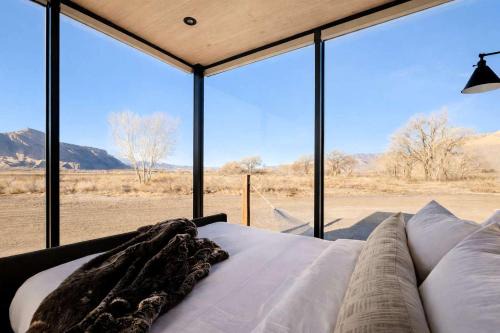Torrey House | Secluded Desert Retreat with Mirrored Glass & Scenic Views | Near Torrey, Utah