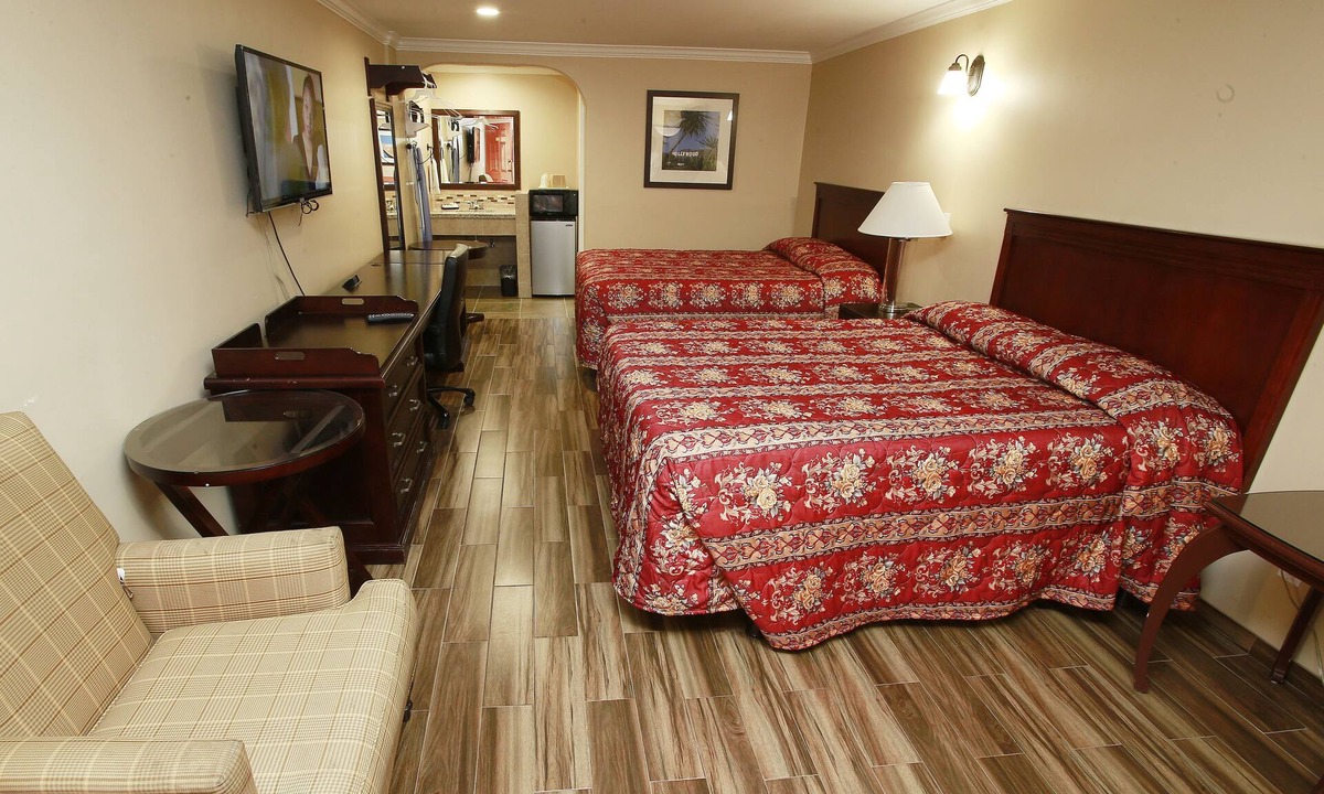 Orange Hotel | Sky Palm Motel