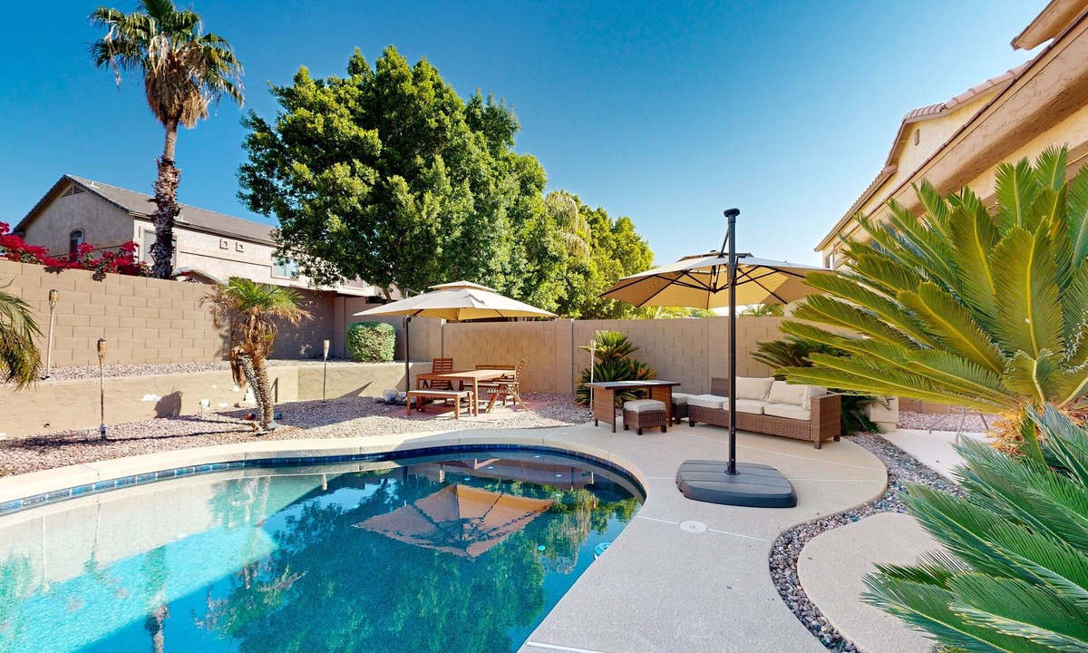 Litchfield Park House | Spacious home surrounded by palms with pool, grill, children's items, & W/D