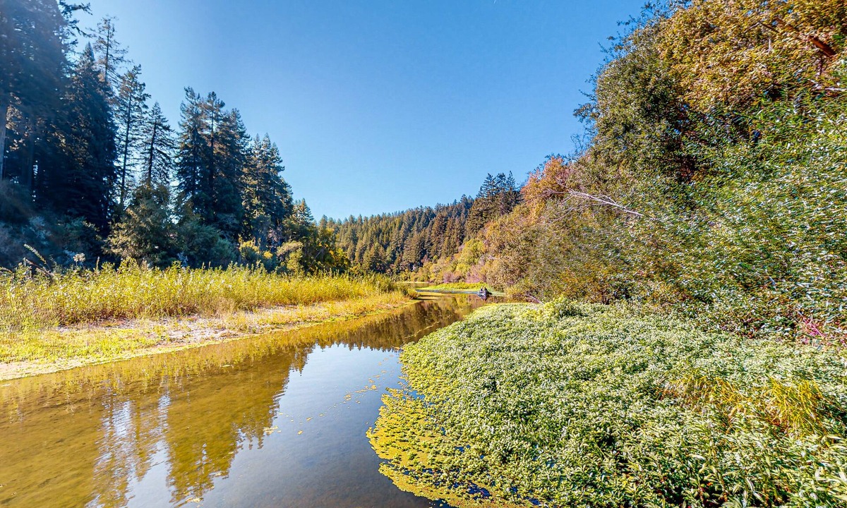 Northwood House | Stunning riverfront estate with hot tub, dock, & fireplace - dog-friendly