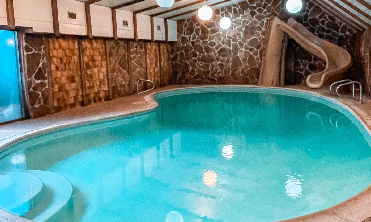 Redmond House | Timber & Springs Retreat: Indoor Pool Hot Tub Theater Room Putting Green