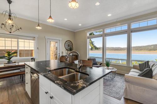 Waldport House | Waterfront home with amazing views & hot tub - public water access 1 mile away