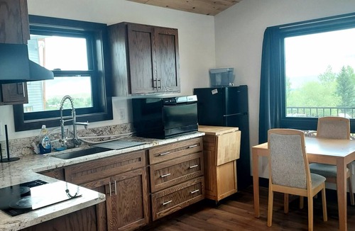 Salmon Ski Chalet | 1 Bedroom Sacagawea Luxury Chalet, has a huge patio, view Three Sisters Mountain