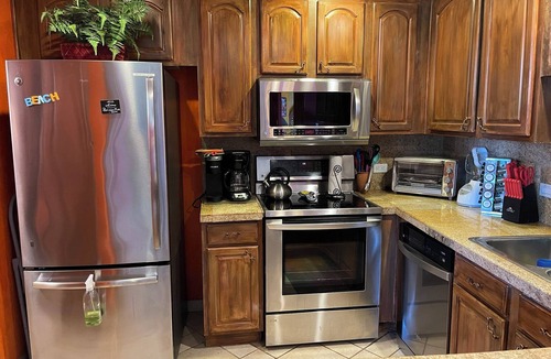 Sandy Beach Condo | 1BR/1ba with DOUBLE-sized living area/balcony, amazing views, & keyless entry!
