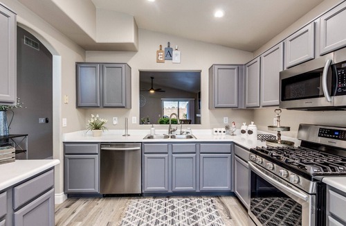 Mesa House | 5 Star Oasis ~ Pool w/Waterfall, Hot Tub, EV Charger & Family Comfort