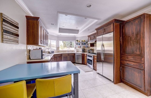 Southwest Anaheim House | 8 Bedroom Pool, Flowing Lazy River & Water Slide near Disneyland! PRIVATE OASIS!
