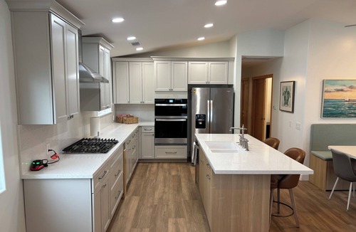 Newport Shores Condo | A Block From The Waves and Newly Remodeled.