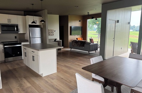 Brookhaven Cabin | A Porch overlooking a golf course is the perfect place to stay in Brookhaven