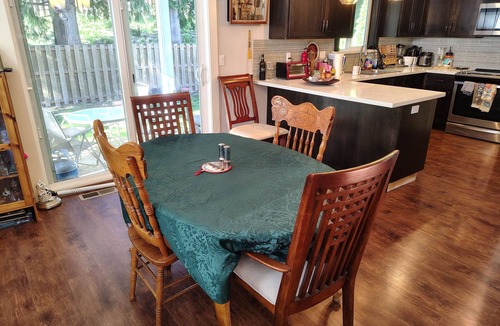 Hazel Dell House | Art filled and spacious 4-bedroom, 2-office house with private yard in Vancouver