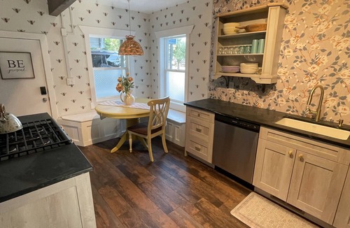 Pleasant Grove Cottage | "BEE Home away from Home!" A pioneer charmer, fully updated with buzzing decor.
