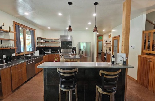 Brookings House | BRAND NEW LISTING Peaceful Riverfront Home - Hot Tub/EV Charger