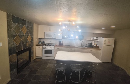 Erda Apartment | Centrally located, mountain views, on the golf course! Comfortable and clean!