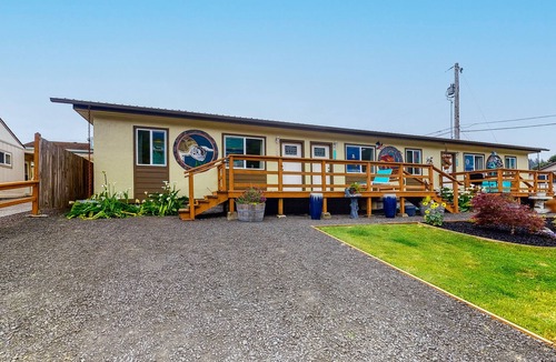 Winchester Bay Condo | Centrally located condo w/ large deck - near the dunes, 1 dog OK!