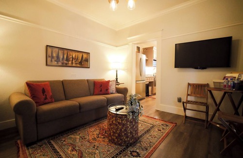 Siskiyou-Hargadine Historic District Apartment | Charming 1 BR Orliena Suite in historic downtown Ashland, OR. Walk to the Oregon Shakespeare Festival, shops, and dining. Features a kitchenette, plush queen bed, and shared hot tub access. Dog friendly!