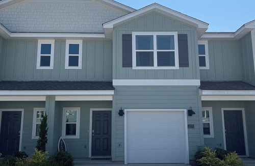 Gulfport House | Charming 3-bedroom townhome in Gulfport, central location, WiFi, in home laundry