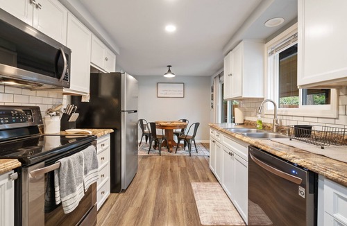 Evergreen House | Cheerful 4 bedroom home one level with hot tub and park like feel