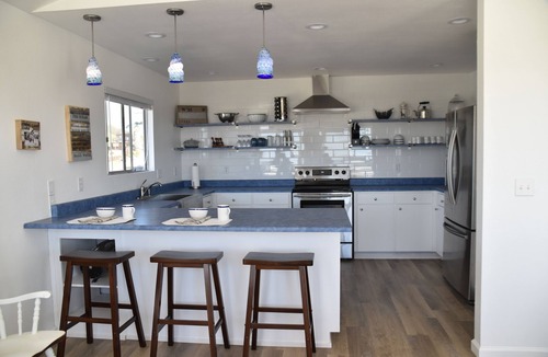 Cayucos House | Coastal VIEWS with easy SURF ACCESS. Home with yard and spa.pets considered!