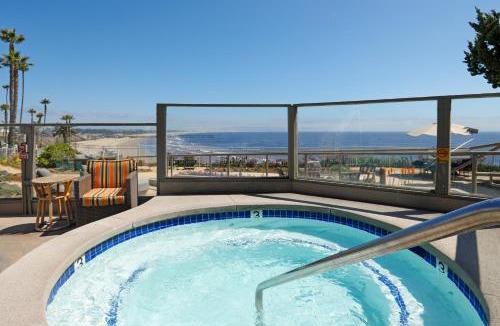Motel District Hotel | Cottage Inn by the Sea