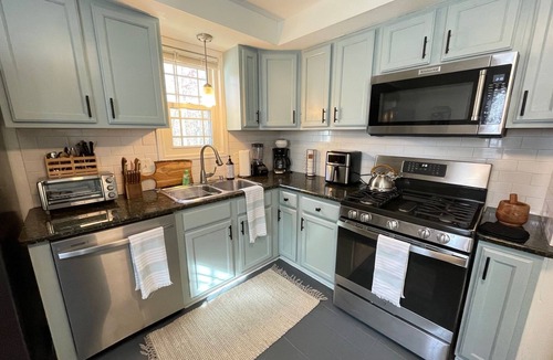 Berea House | Cozy 5BR & 2 Bath-CLE, BW, IX Center-walkout basement - firepit - dog friendly!
