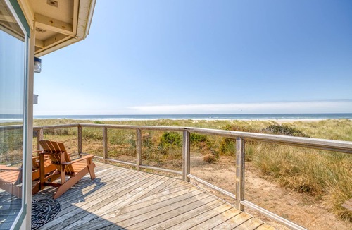 Bayshore House | Cozy Oceanfront Home with Wrap Around Windows! Beach access on the property!