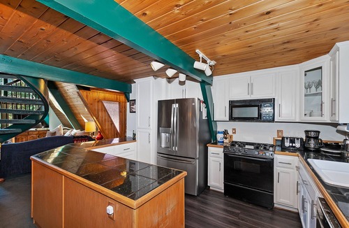 Upper Moonridge Cabin | Curly's Cabin By Destination Big Bear:A-Frame Cabin! Unique Circular Fireplace! Pet Friendly! Located in Lower Moonridge!