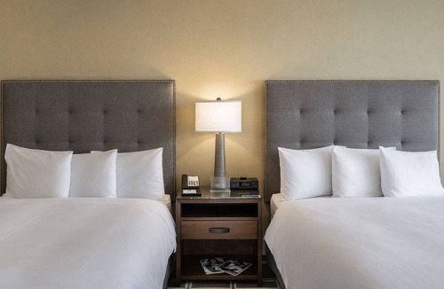 Sunnyvale West Hotel | Deluxe 2 Queens at The Grand Hotel, Onsite Pool, Pets Allowed, Free Parking