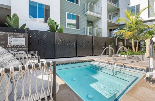 Kearny Mesa Apartment | Deluxe Penthouse Paradise: Heated Pool, Gym, Games. Parking