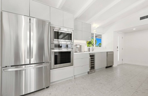 Magnesia Falls Cove House | 'Desert Tones' mid-century modern pool and spa home with lots of amenities!