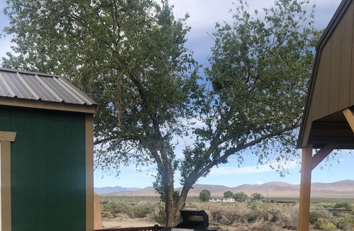 Imlay Cabin | Doc Holliday, has a double bed, sleeps 2 and has a detached private bathroom.