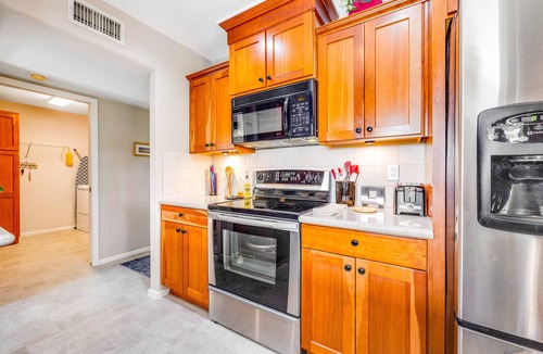 Sunland Village East House | Dog-friendly, golf course adjacent home with a pool, hot tub, & fitness center