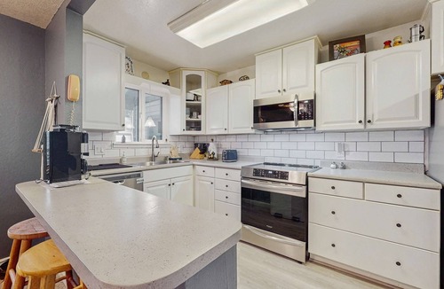 Tahoe Island House | Dog-Friendly Home with Hot Tub, Lovely Backyard Meadow, Walk to Shops & Restaurants