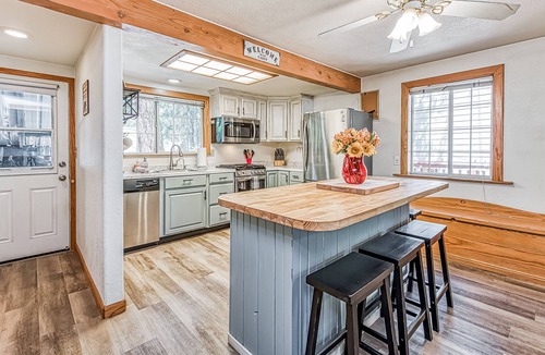 West Village House | Dog-friendly home with covered deck, fireplace, washer/dryer, & ping-pong table
