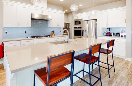 Southwest Bend House | Dog-friendly home with hot tub, grill, patio, firepit, home gym, fireplace & W/D