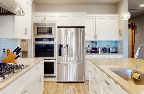 Southwest Bend House | Dog-friendly home with hot tub, grill, patio, firepit, home gym, fireplace & W/D