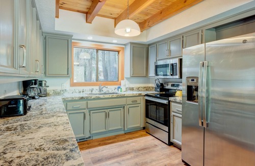 McKinney Estates House | Dog-friendly house in the trees with spacious deck, firepit, hot tub & grill