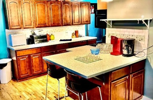 Fort Scott Apartment | Downtown 2BR Sleeps 8 Historic 1911