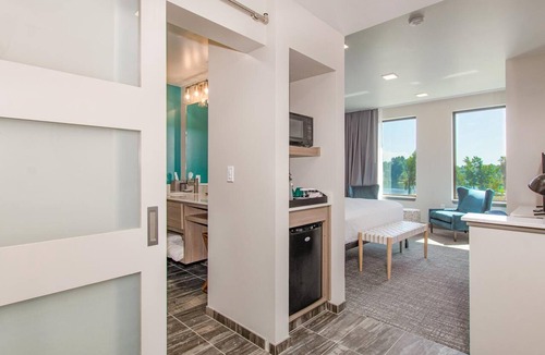 Independence Hotel | Enjoy Scenic Riverfront Stays at a Spacious Room with Locally Inspired Design