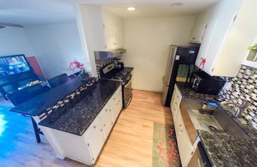 Huntington Beach House | entire home for rental near beach, heated pool and hot tub jucuzzi, weight room.