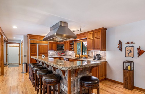 Clark Fork House | Expansive Riverfront Lodge with Dock, Game Room, Bar & Spacious Deck!