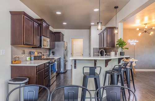 Medford House | Fully renovated 4 bedroom 3 bath house that sleeps 15. Hot tub. Garage game room